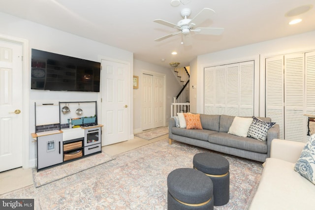 216 Christian St Unit E, Philadelphia, PA 19147 - living area featuring a ceiling fan, stairway, and recessed lighting