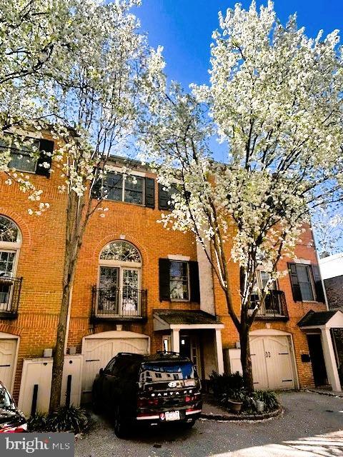 216 Christian St Unit E, Philadelphia, PA 19147 - view of front facade featuring brick siding