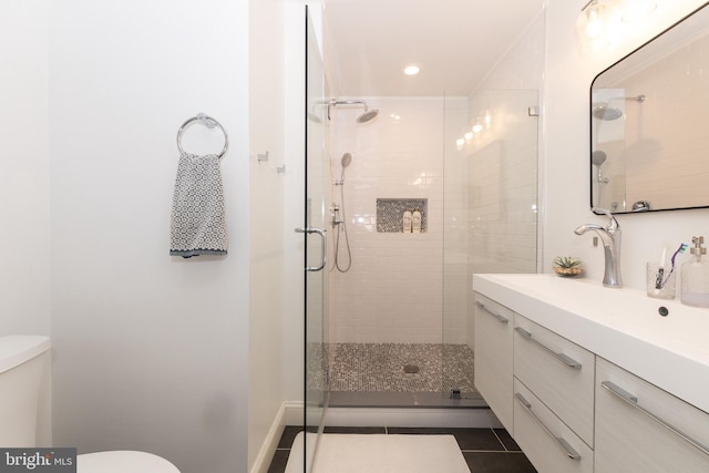 216 Christian St Unit E, Philadelphia, PA 19147 - full bathroom with vanity, a stall shower, tile patterned floors, and recessed lighting