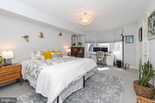 216 Christian St Unit E, Philadelphia, PA 19147 - bedroom featuring carpet, a desk, and a chandelier