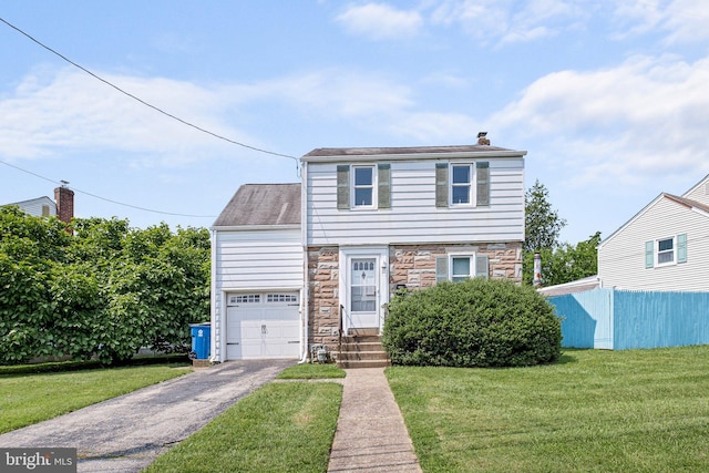 17 Alvil Rd, Wilmington, DE 19805 - colonial house featuring stone siding, asphalt driveway, and a chimney
