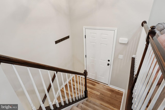 1442 Peacock Ln, Hellertown, PA 18055 - staircase featuring wood finished floors and baseboards