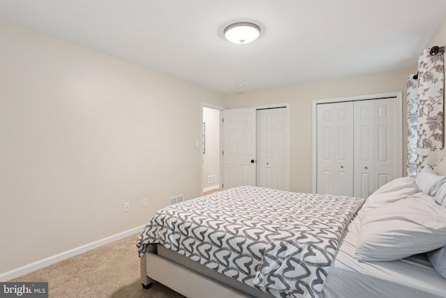 1442 Peacock Ln, Hellertown, PA 18055 - carpeted bedroom with baseboards and two closets