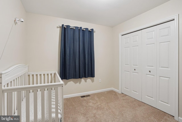 1442 Peacock Ln, Hellertown, PA 18055 - unfurnished bedroom featuring carpet, a crib, and a closet