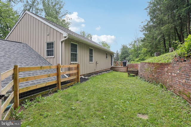 1442 Peacock Ln, Hellertown, PA 18055 - view of property exterior with board and batten siding, a fenced backyard, and roof with shingles