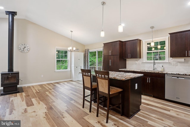 1442 Peacock Ln, Hellertown, PA 18055 - kitchen with stainless steel dishwasher, light wood-type flooring, vaulted ceiling, and dark brown cabinetry