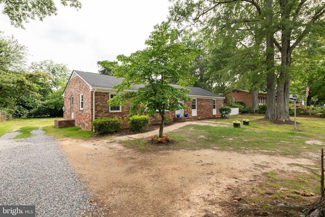 10401 W Huguenot Rd, North Chesterfield, VA 23224 - view of front of house with brick siding and driveway
