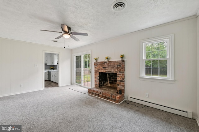 10401 W Huguenot Rd, North Chesterfield, VA 23224 - unfurnished living room featuring baseboard heating, ceiling fan, carpet, a brick fireplace, and a textured ceiling