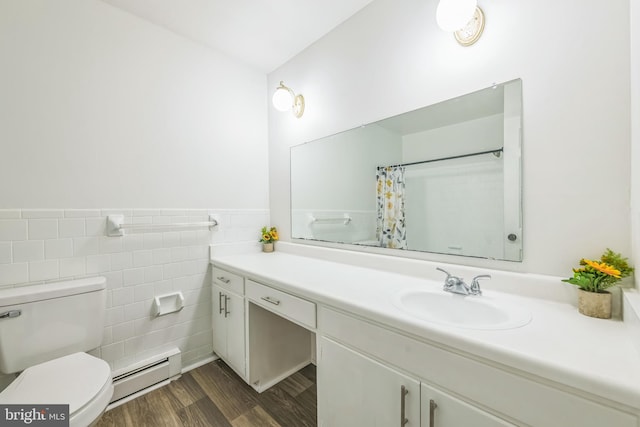 10401 W Huguenot Rd, North Chesterfield, VA 23224 - bathroom with baseboard heating, vanity, tile walls, wood finished floors, and curtained shower