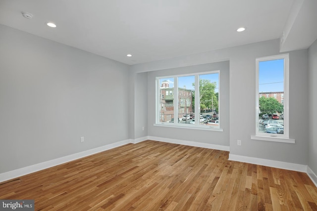 1640 Cambridge St, Philadelphia, PA 19130 - empty room with light wood-style floors, a smoke detector, and recessed lighting