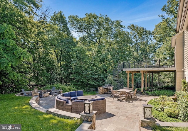 43858 Grantner Pl, Ashburn, VA 20147 - view of patio featuring an outdoor living space with a fire pit, outdoor dining area, and area for grilling