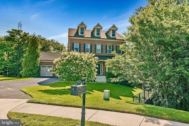 43858 Grantner Pl, Ashburn, VA 20147 - colonial-style house with brick siding and driveway