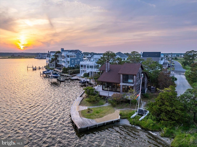 35197 Hassell Ave, Bethany Beach, DE 19930 - aerial view at dusk of a water view and a residential view