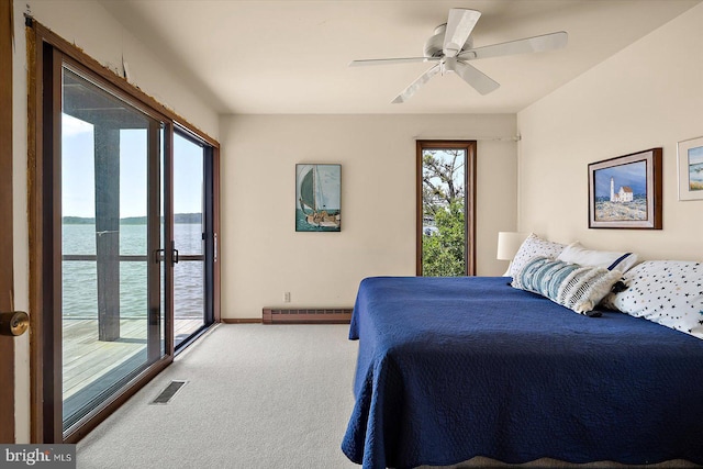 35197 Hassell Ave, Bethany Beach, DE 19930 - bedroom featuring a baseboard radiator, carpet floors, access to exterior, a water view, and ceiling fan