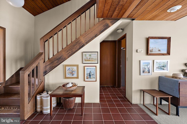 35197 Hassell Ave, Bethany Beach, DE 19930 - staircase with wood ceiling and tile patterned flooring