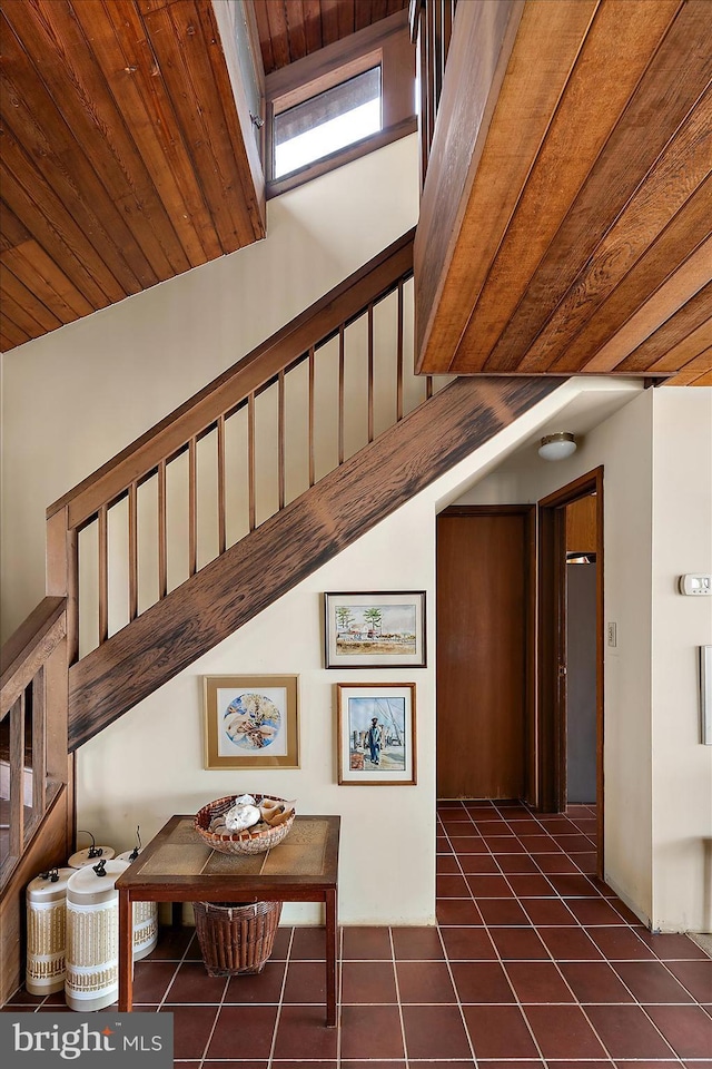 35197 Hassell Ave, Bethany Beach, DE 19930 - staircase with tile patterned floors and wood ceiling