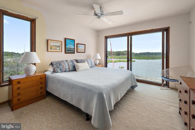 35197 Hassell Ave, Bethany Beach, DE 19930 - bedroom with access to outside, carpet flooring, a water view, and a ceiling fan