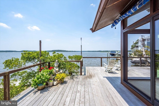 35197 Hassell Ave, Bethany Beach, DE 19930 - wooden terrace with a water view