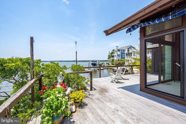 35197 Hassell Ave, Bethany Beach, DE 19930 - wooden terrace featuring a water view
