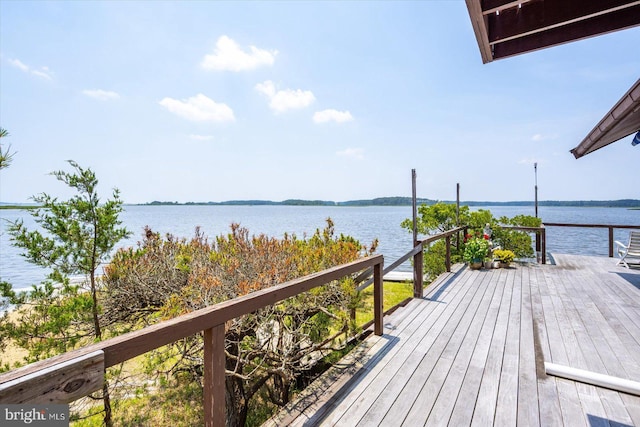 35197 Hassell Ave, Bethany Beach, DE 19930 - wooden deck featuring a water view