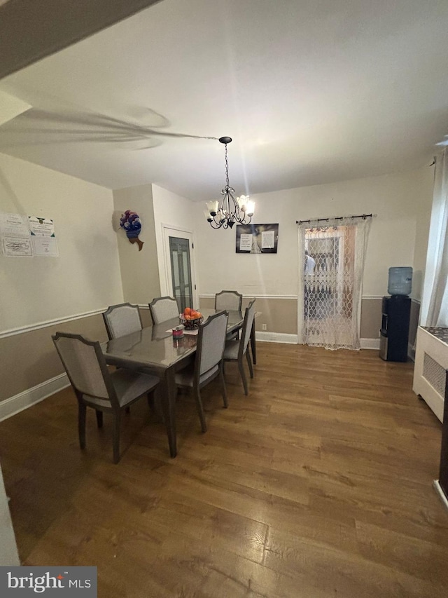 2228 Manor Ave, Upper Darby, PA 19082 - dining room featuring a chandelier and wood finished floors