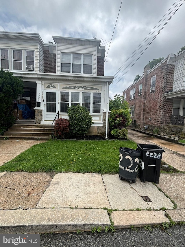 2228 Manor Ave, Upper Darby, PA 19082 - view of front of house featuring a front yard