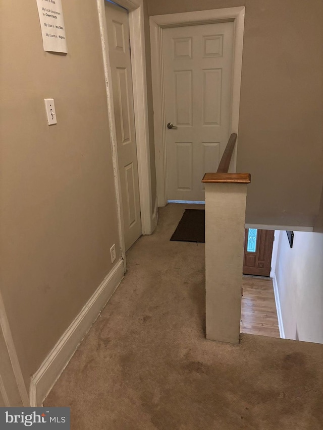 2228 Manor Ave, Upper Darby, PA 19082 - hallway with light colored carpet and an upstairs landing