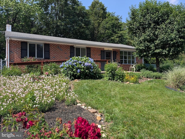 2149 Dixon Ave, Croydon, PA 19021 - ranch-style house featuring brick siding, a chimney, and a front lawn