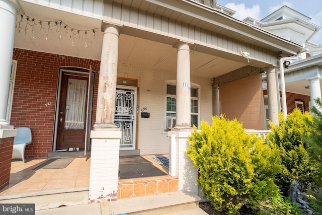 719 N 11th St, Allentown, PA 18102 - entrance to property featuring a porch and brick siding