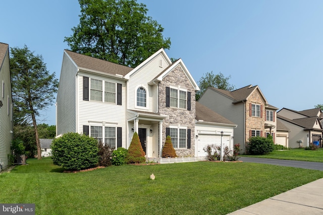 55 Hamlet Cir, Mechanicsburg, PA 17050 - traditional home with stone siding, driveway, an attached garage, and a front yard