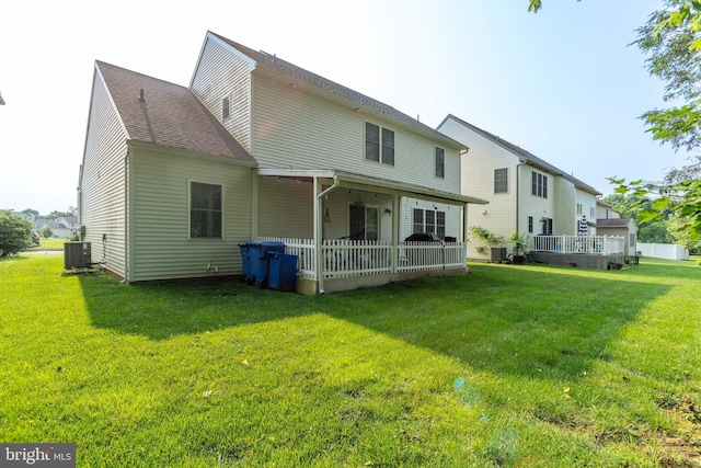 55 Hamlet Cir, Mechanicsburg, PA 17050 - rear view of house featuring a lawn and a shingled roof