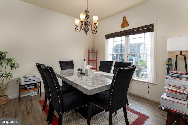 55 Hamlet Cir, Mechanicsburg, PA 17050 - dining area with a chandelier and wood finished floors