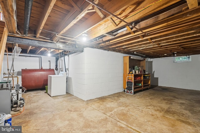 1243 Grove Rd, West Chester, PA 19380 - basement with washer / dryer, heating fuel, a heating unit, and concrete block wall
