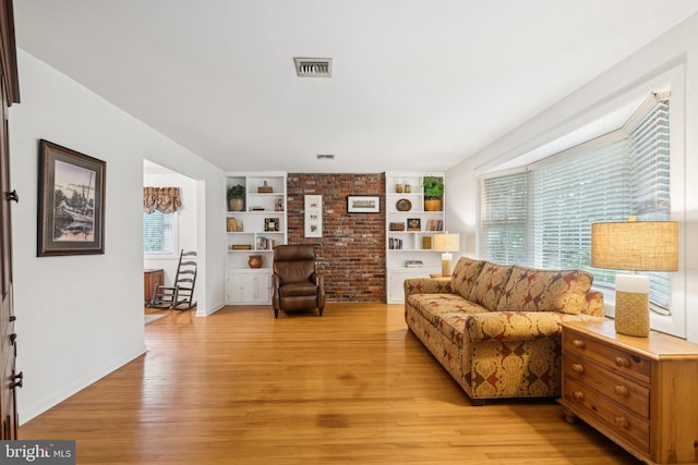 1243 Grove Rd, West Chester, PA 19380 - living area featuring light wood-style floors and built in shelves