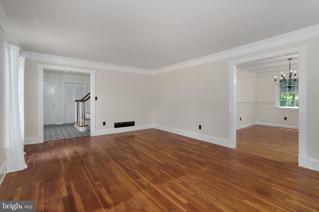 92 Lochatong Rd, Ewing, NJ 08628 - unfurnished living room with a chandelier, hardwood / wood-style floors, ornamental molding, and stairway