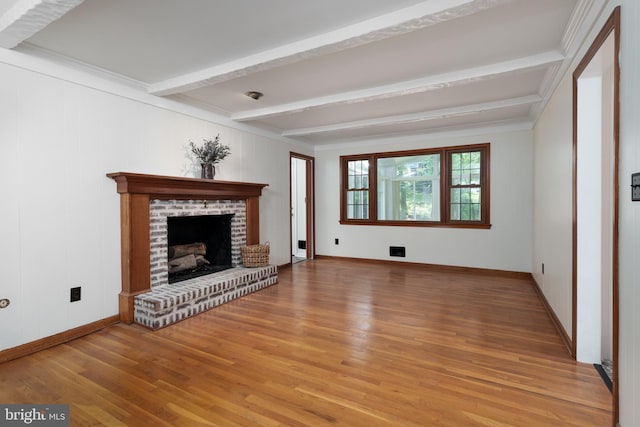 92 Lochatong Rd, Ewing, NJ 08628 - unfurnished living room featuring light wood-type flooring, a brick fireplace, and beamed ceiling