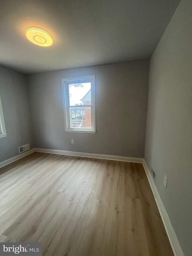 3805 Arbutus, Baltimore, MD 21207 - empty room featuring wood finished floors and baseboards