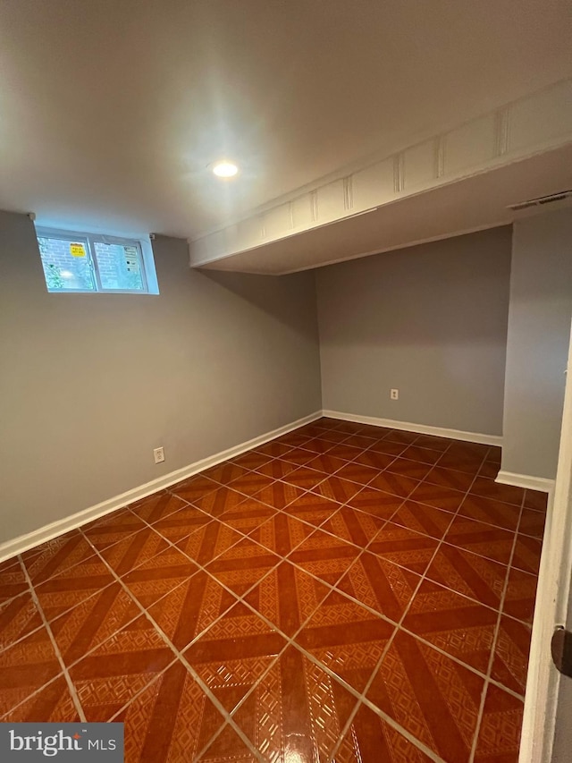 3805 Arbutus, Baltimore, MD 21207 - basement with dark tile patterned flooring and baseboards