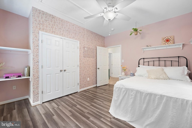 11871 Knollcrest Ln, La Plata, MD 20646 - bedroom featuring wood finished floors, wallpapered walls, a closet, and ceiling fan