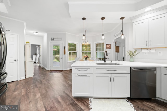 11871 Knollcrest Ln, La Plata, MD 20646 - kitchen featuring stainless steel dishwasher, a peninsula, light countertops, dark wood-style flooring, and hanging light fixtures