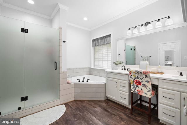 11871 Knollcrest Ln, La Plata, MD 20646 - full bath featuring double vanity, a stall shower, a garden tub, wood finished floors, and ornamental molding