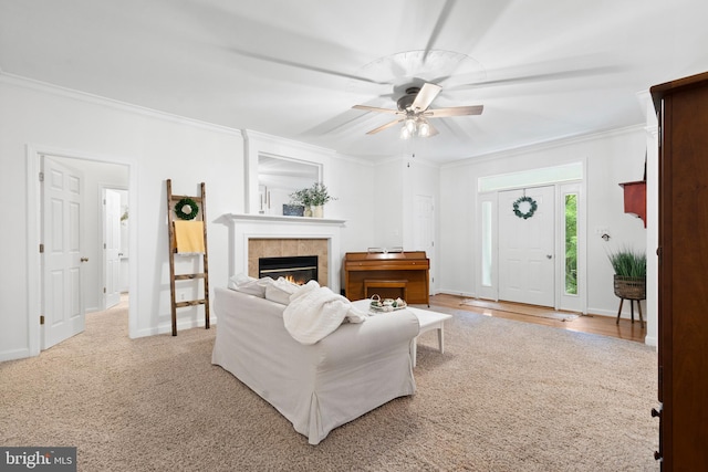 11871 Knollcrest Ln, La Plata, MD 20646 - living area with ornamental molding, a ceiling fan, and a tiled fireplace