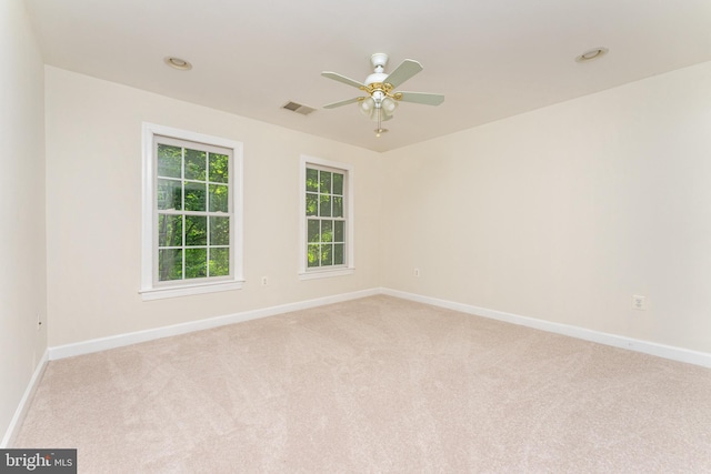 7412 Kallenburg Ct, Manassas, VA 20111 - empty room with light carpet, a ceiling fan, and recessed lighting