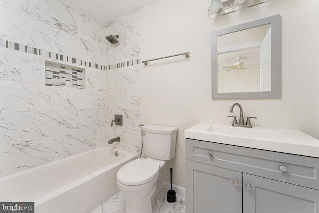 7412 Kallenburg Ct, Manassas, VA 20111 - bathroom with vanity, marble look tiles, bathing tub / shower combination, and a ceiling fan
