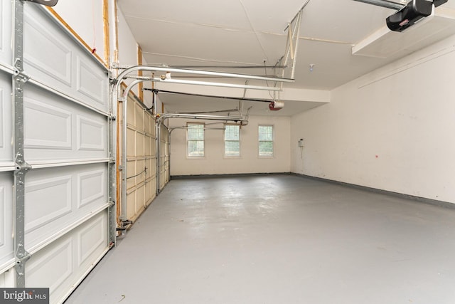 7412 Kallenburg Ct, Manassas, VA 20111 - garage featuring a garage door opener