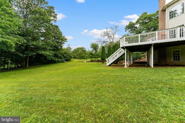 7412 Kallenburg Ct, Manassas, VA 20111 - view of grassy yard featuring stairway and a wooden deck
