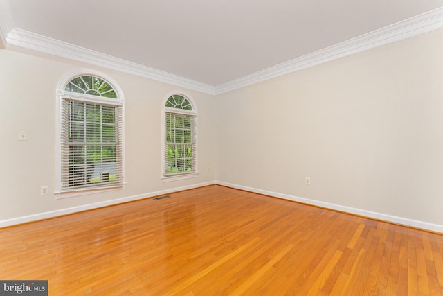 7412 Kallenburg Ct, Manassas, VA 20111 - spare room with crown molding and light wood-type flooring