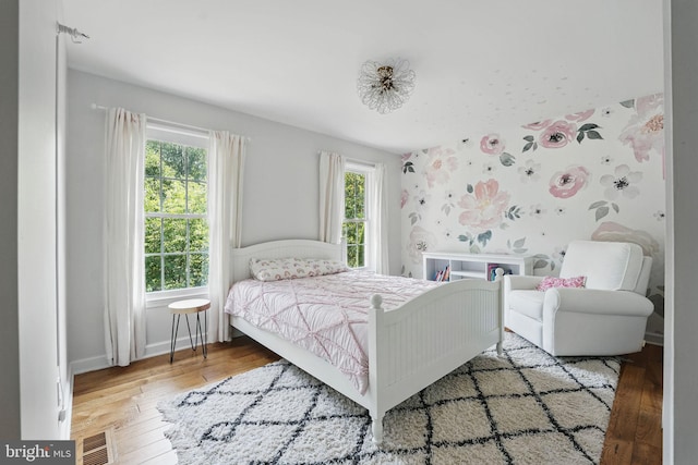 6134 Long Meadow Rd, Mclean, VA 22101 - bedroom with multiple windows and hardwood / wood-style floors