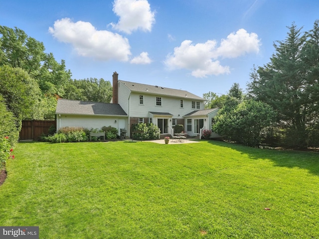 6134 Long Meadow Rd, Mclean, VA 22101 - back of property featuring a patio and a chimney