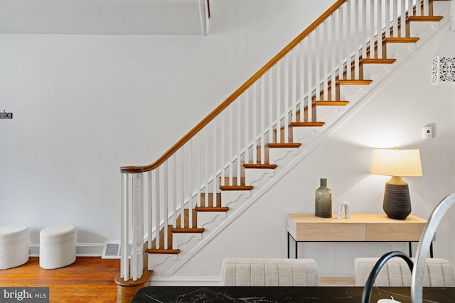 828 Mercer St, Philadelphia, PA 19125 - stairway featuring wood finished floors and baseboards